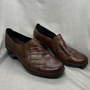 Clarks slip-ons in brown leather.